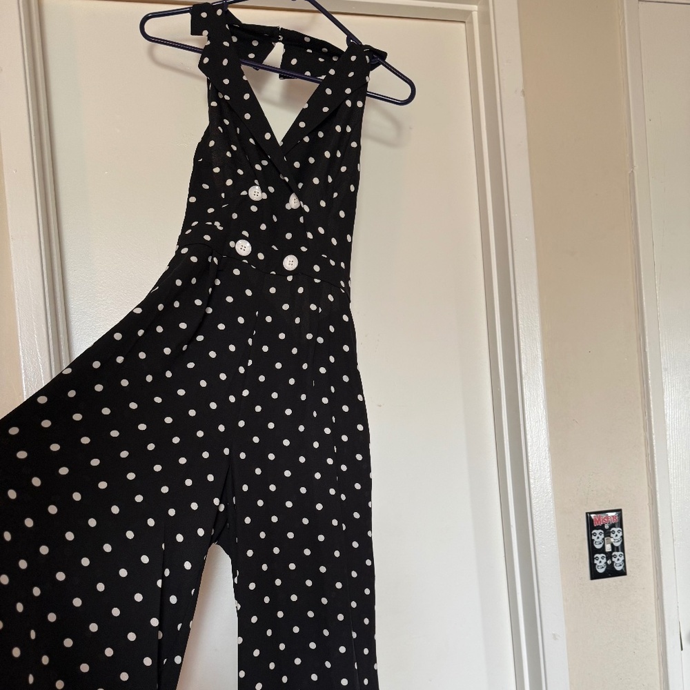 Black jumpsuit with polka dots